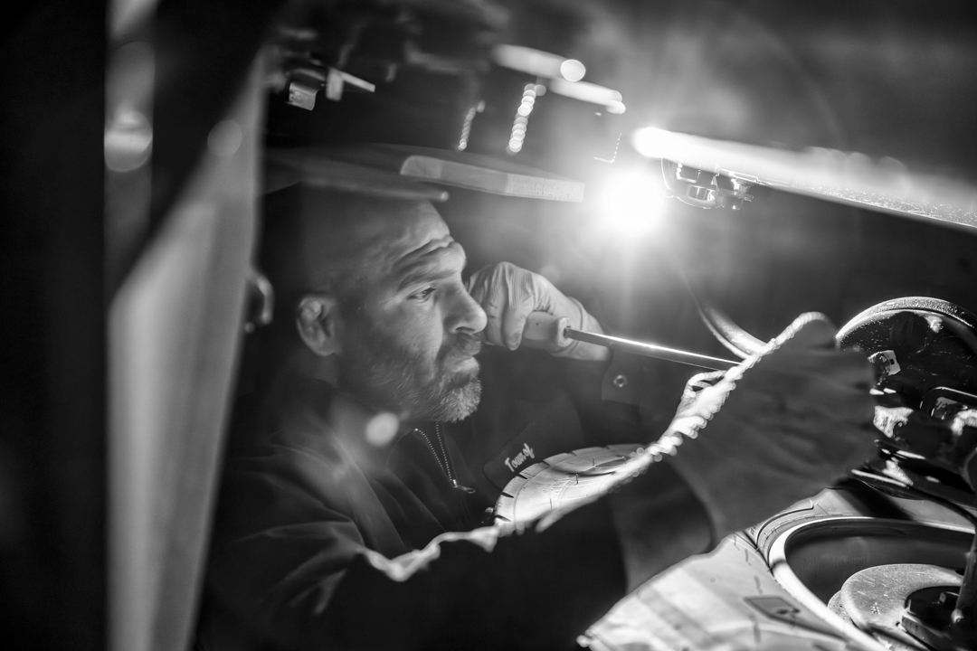 A town maintenance worker focused on his work.